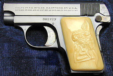 Colt Model N with Factory Carved Steerhead Ivory grips.