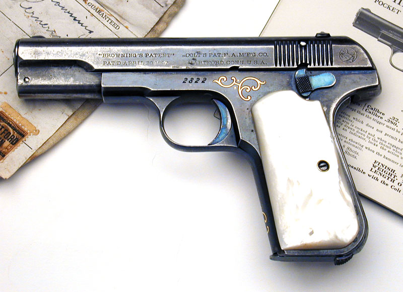 Colt 1903 Pocket Hammerless .32 ACP Factory Engraved & Inscribed, Gold Inlaid with Mother of Pearl stocks.